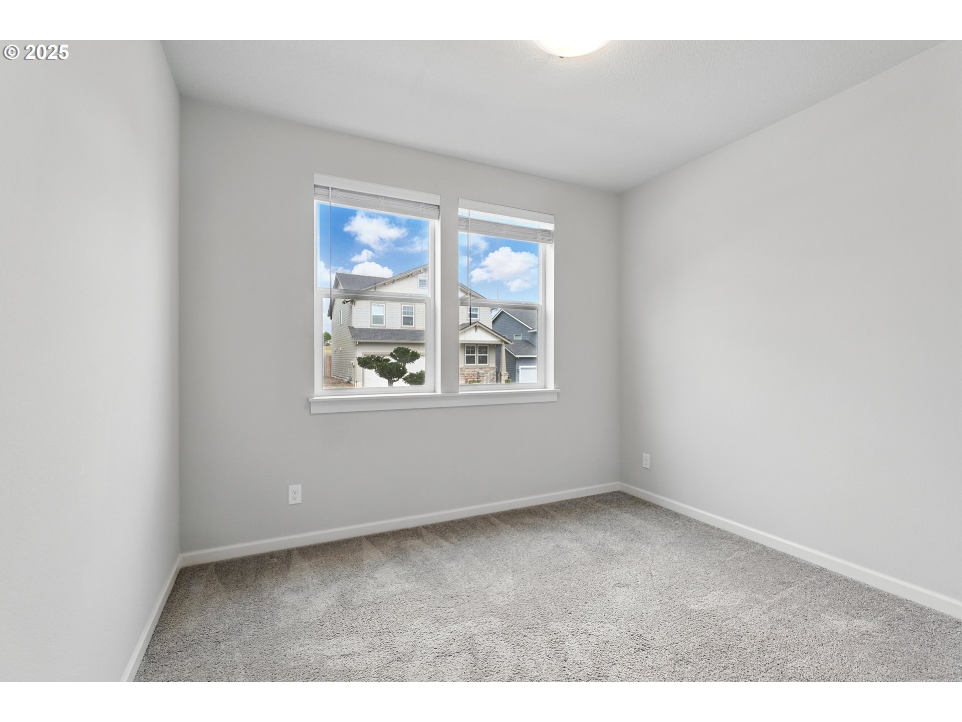 2582 Southwest Thomas Way Gresham, OR 97080 - Photo 27 of 36 an empty room with windows