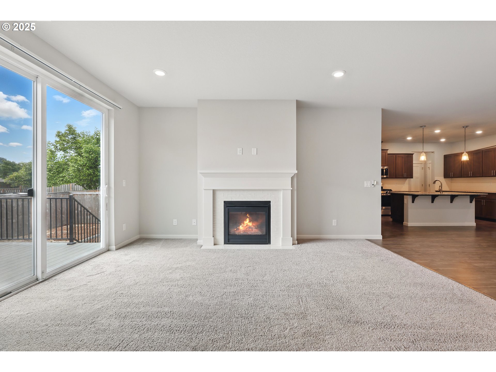 2582 Southwest Thomas Way Gresham, OR 97080 - Photo 6 of 36 a view of an empty room with a fireplace