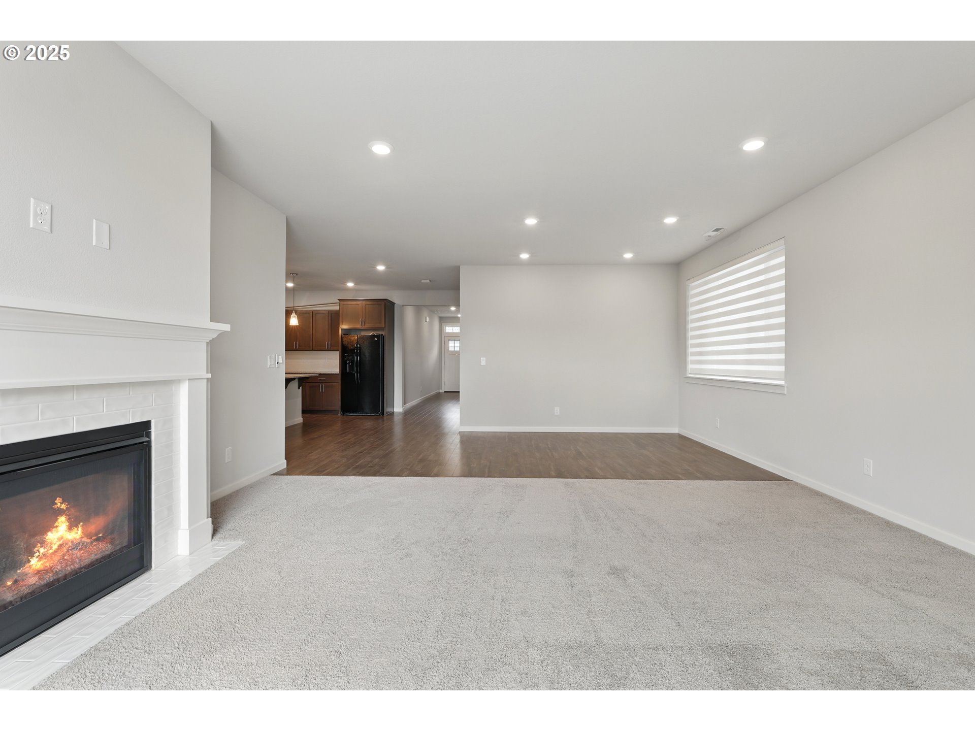 2582 Southwest Thomas Way Gresham, OR 97080 - Photo 7 of 36 a view of an empty room and a fireplace