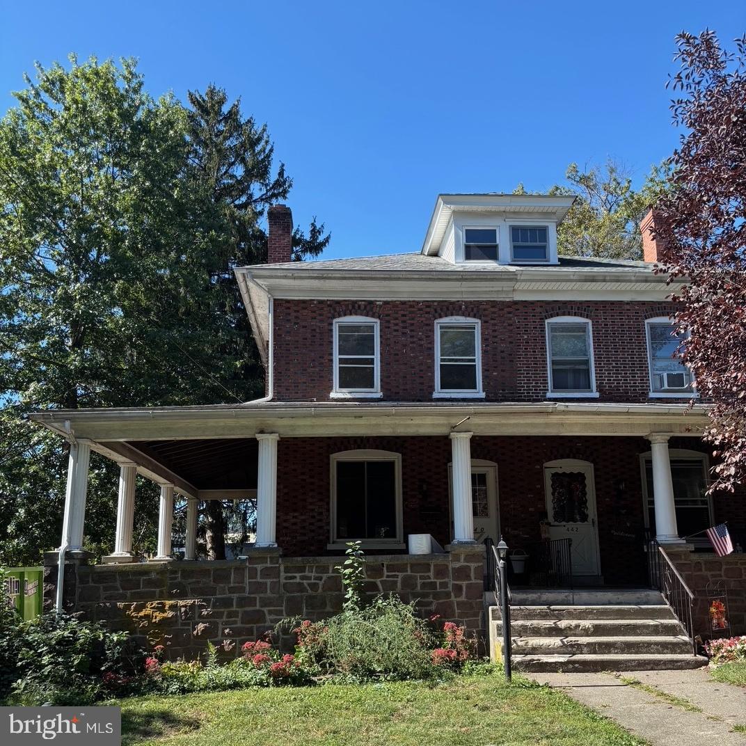 440 North Penn Street Spring City, PA 19475 - Photo 1 of 13 a front view of a house with garden