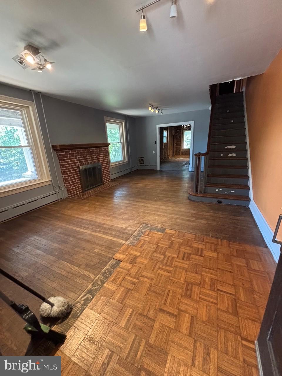 440 North Penn Street Spring City, PA 19475 - Photo 3 of 13 a view of a livingroom with furniture hardwood floor and a ceiling fan