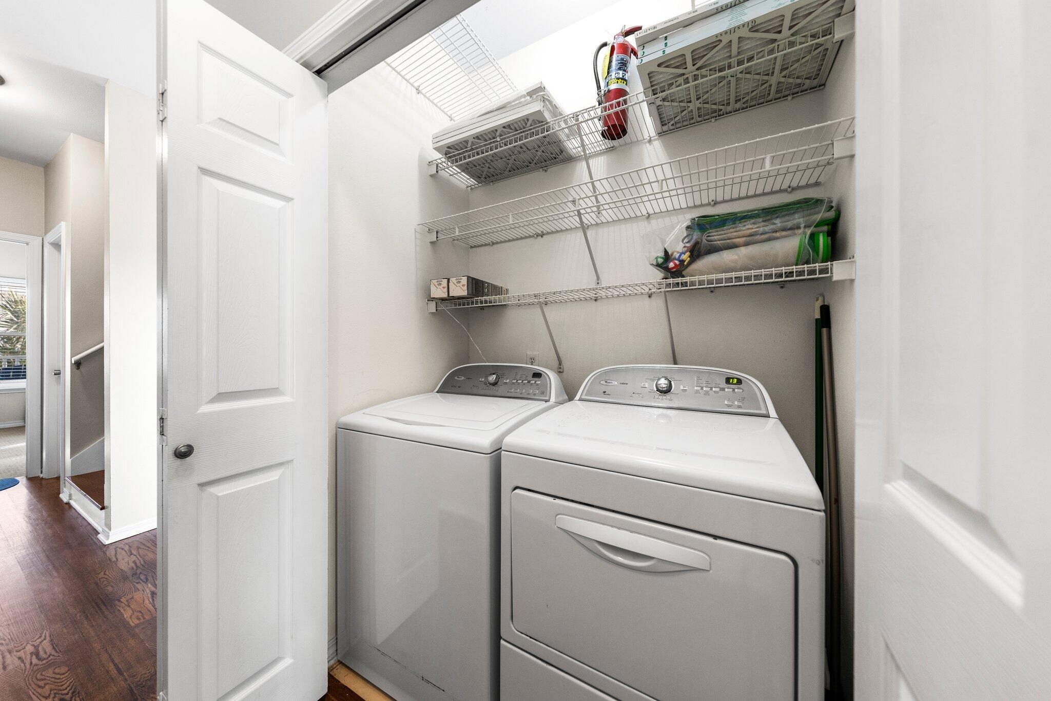 156 Emerald Dunes Circle Santa Rosa Beach, FL 32459 - Photo 15 of 43 a utility room with dryer and washer