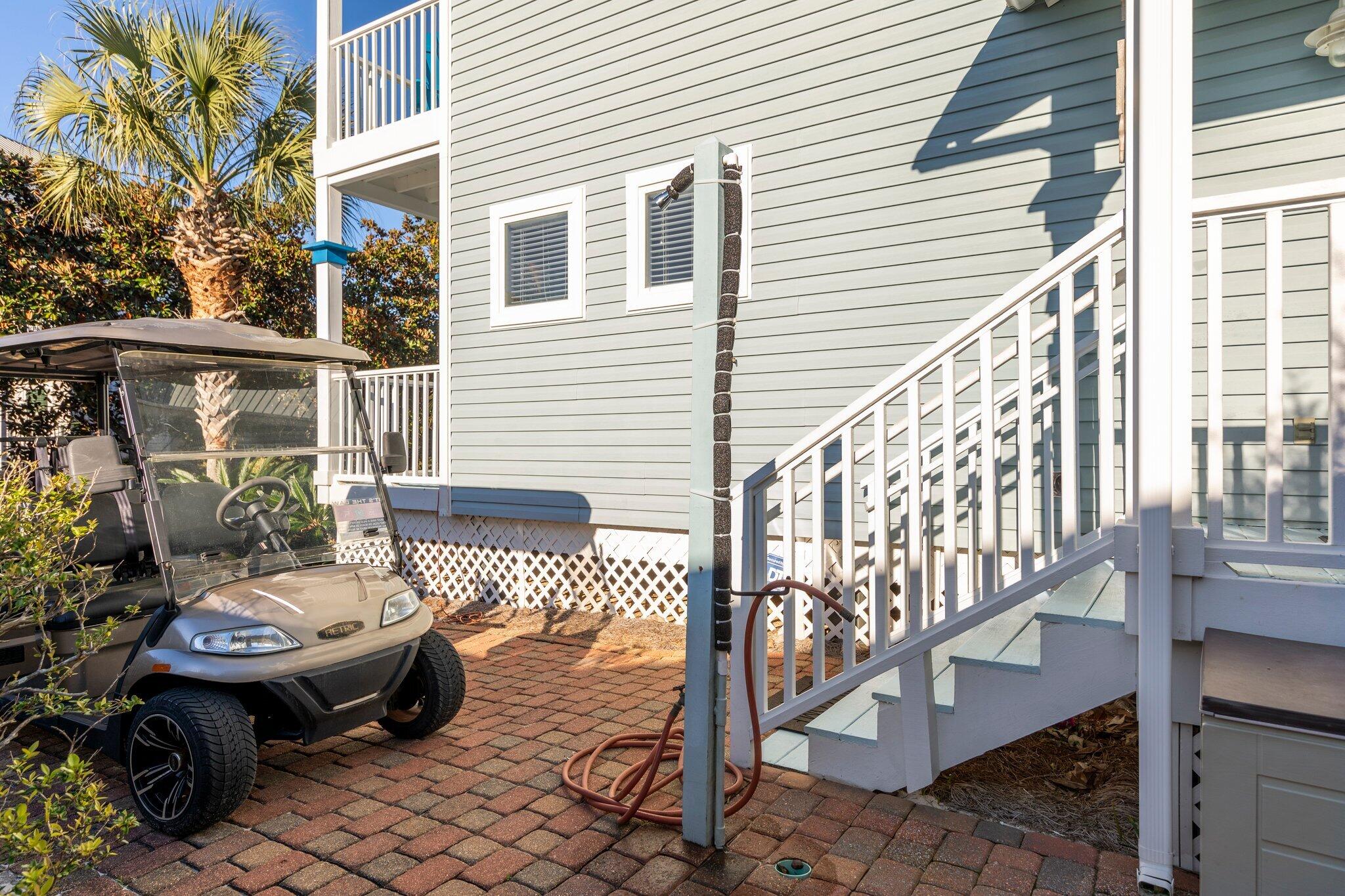 156 Emerald Dunes Circle Santa Rosa Beach, FL 32459 - Photo 28 of 43 a view of a patio with couches table and chairs and potted plants