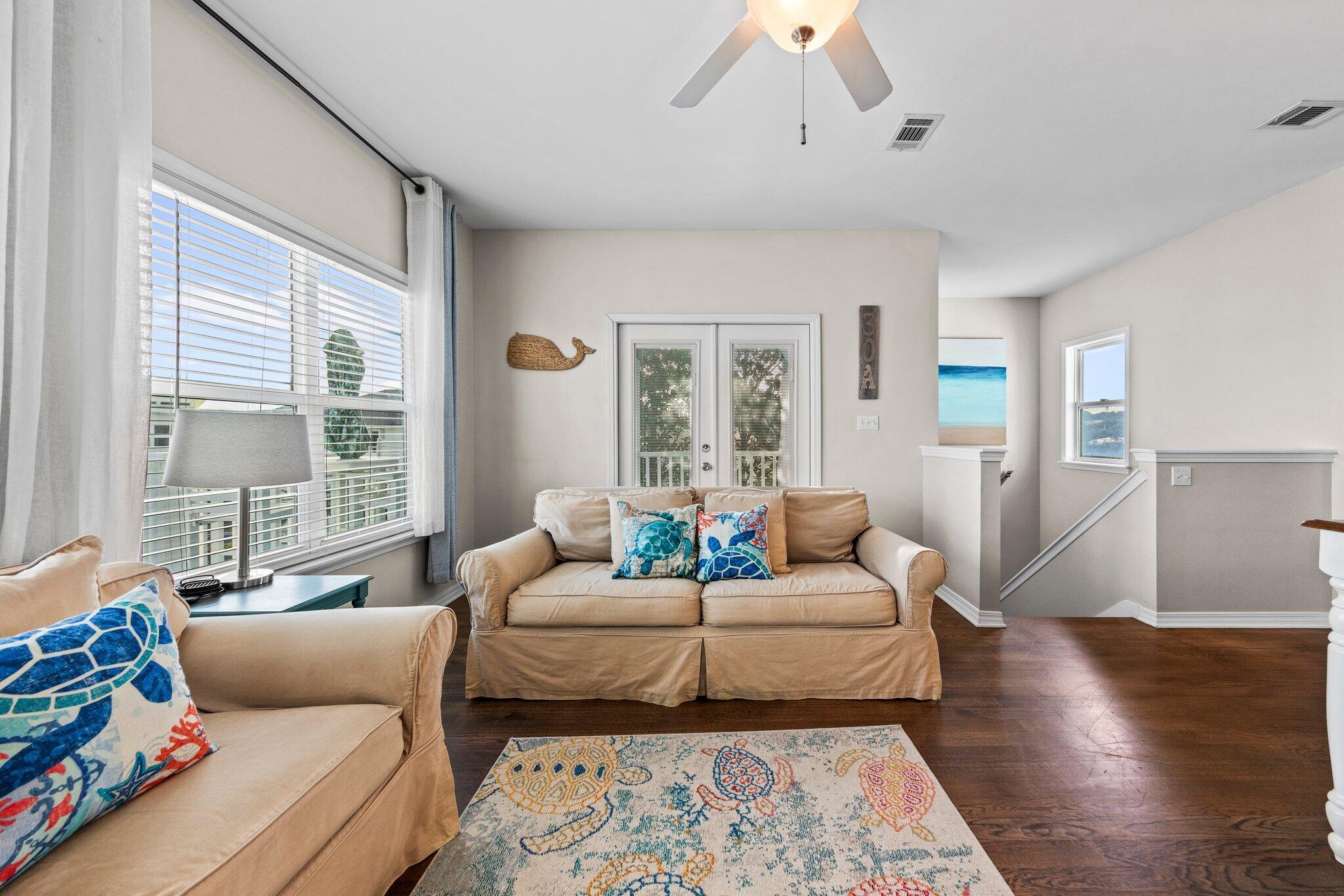 156 Emerald Dunes Circle Santa Rosa Beach, FL 32459 - Photo 3 of 43 a living room with furniture and a large window