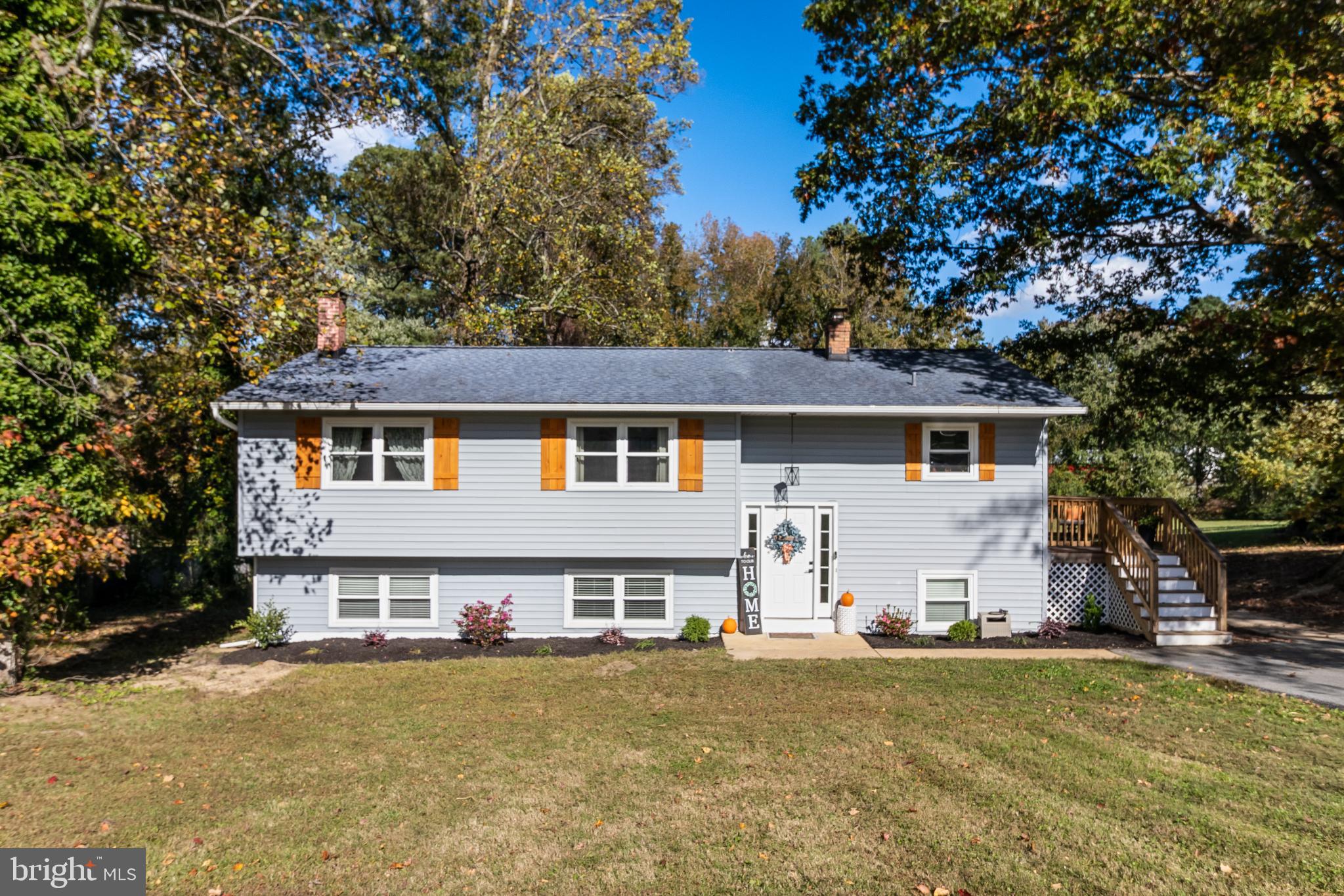 Charming split-level home with vibrant accents.