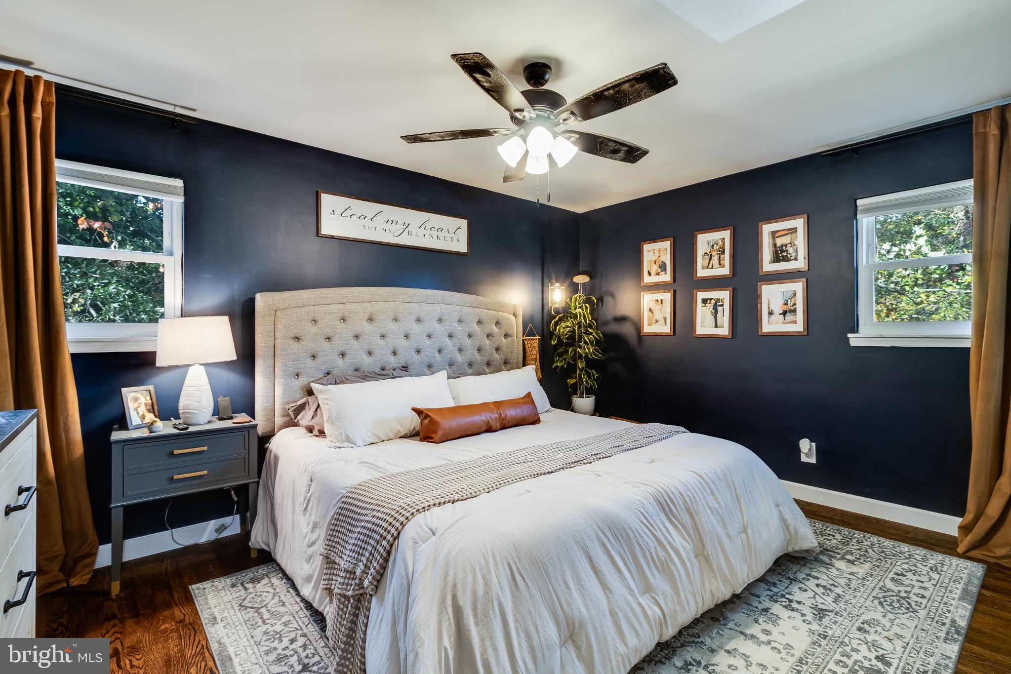 24440 Morgan Road Hollywood, MD 20636 - Photo 16 of 38 Serene bedroom with rich navy accents.