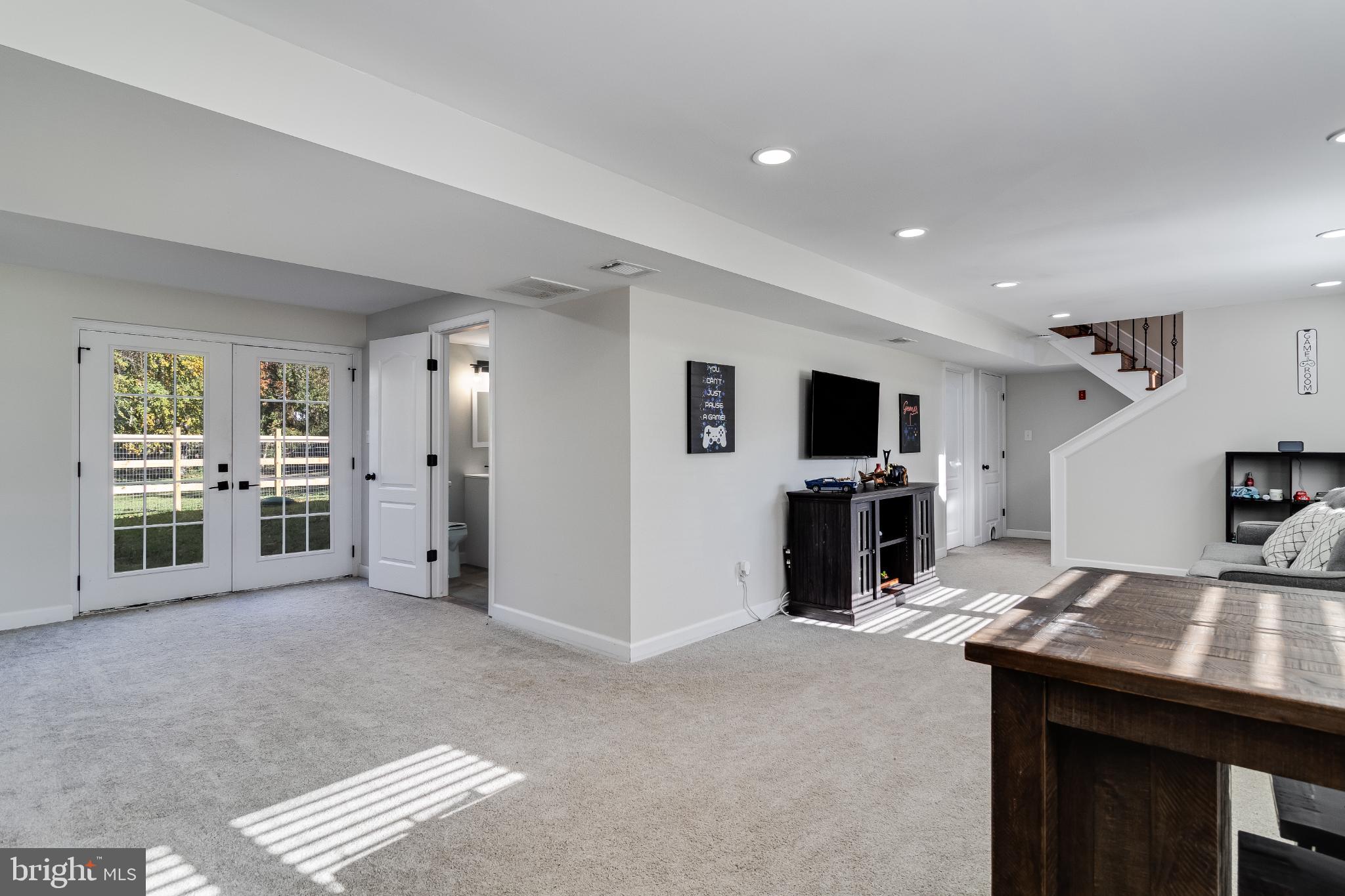 24440 Morgan Road Hollywood, MD 20636 - Photo 25 of 38 Spacious, light-filled basement retreat.