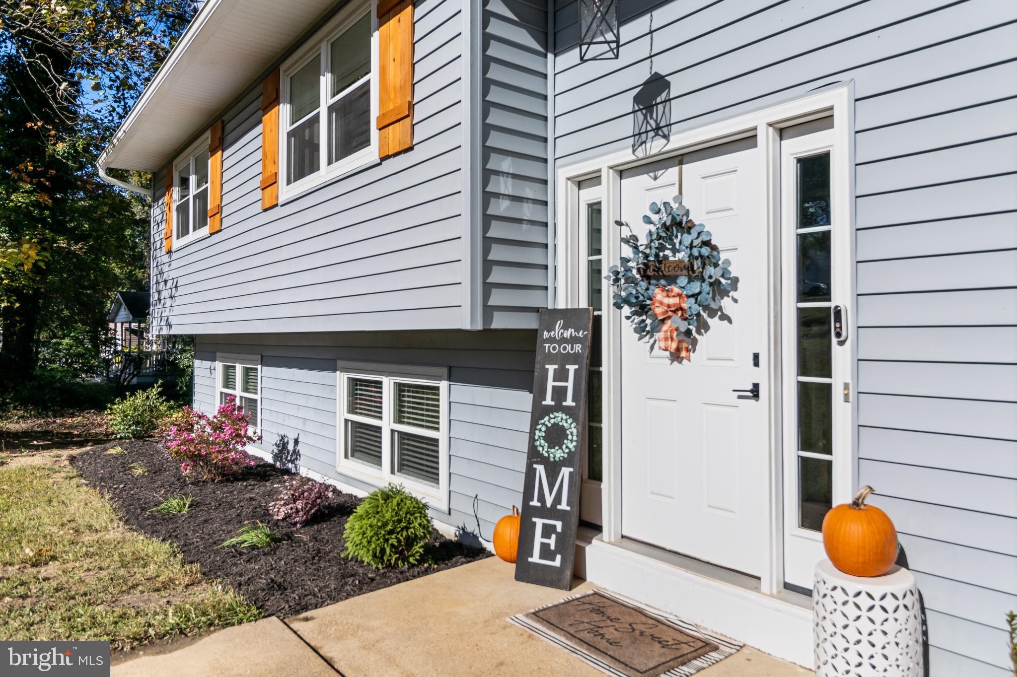 Charming entryway with autumn accents.