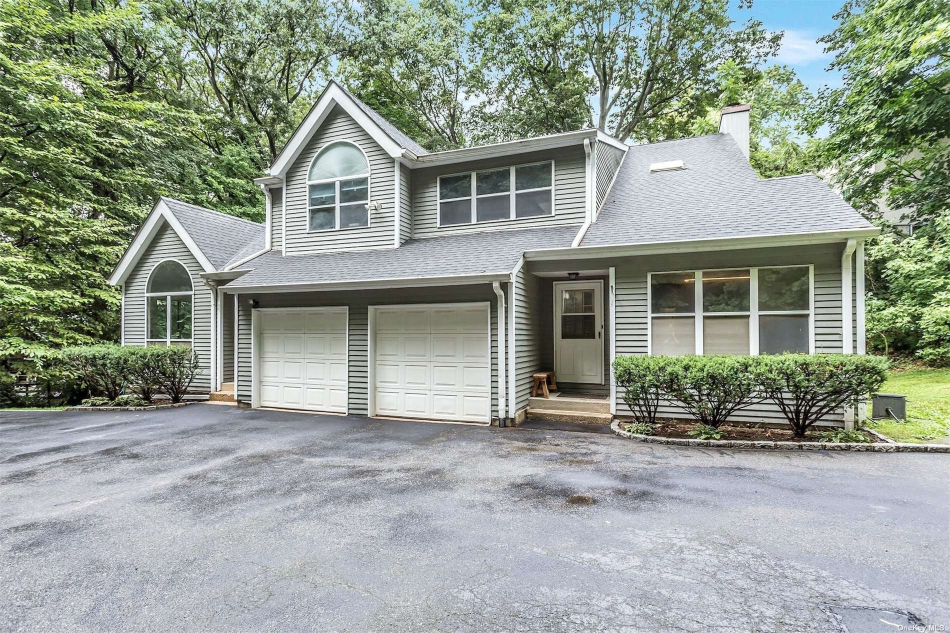 a front view of a house with outdoor space