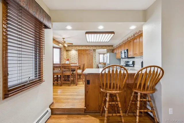 a view of a dining room with furniture window and outside view