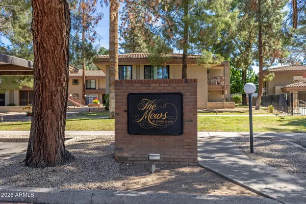 a sign on the side of the road