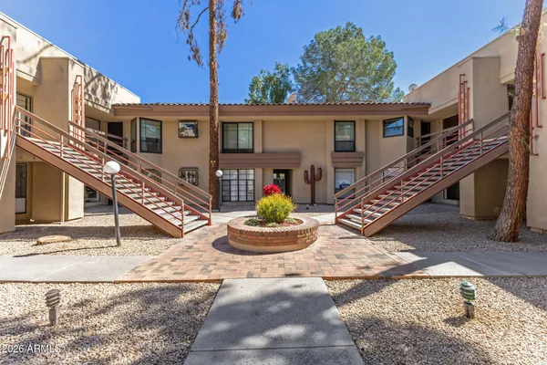 a front view of house with outdoor space