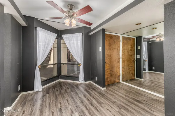 a view of a swimming pool with an outdoor seating