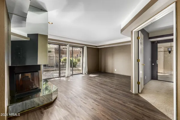 a view of entryway with wooden floor