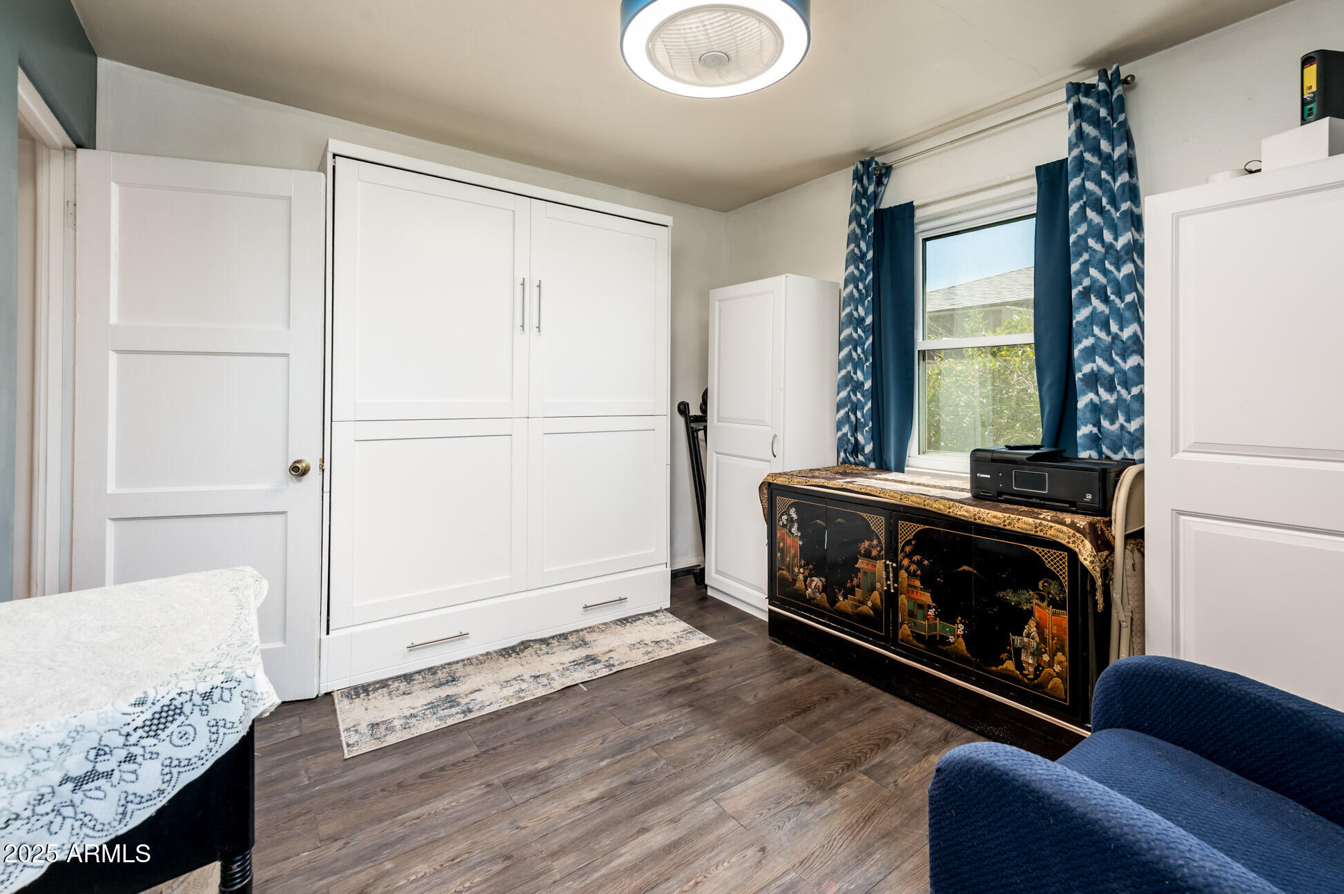 2221 West Mitchell Drive Phoenix, AZ 85015 - Photo 25 of 45 a living room with furniture and a fireplace