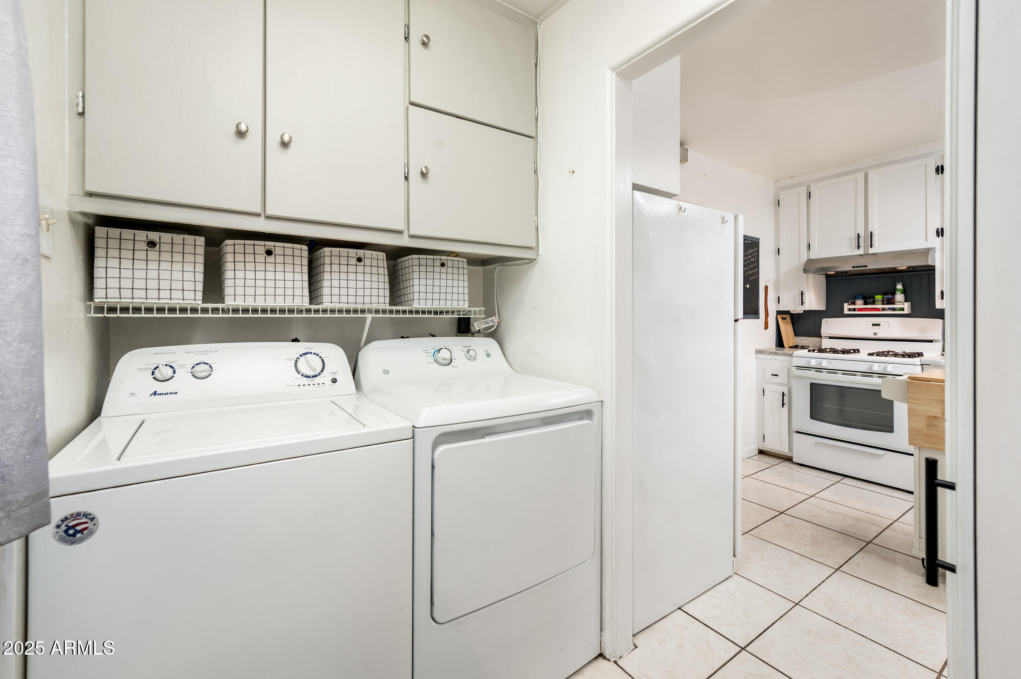2221 West Mitchell Drive Phoenix, AZ 85015 - Photo 28 of 45 a utility room with dryer and washer