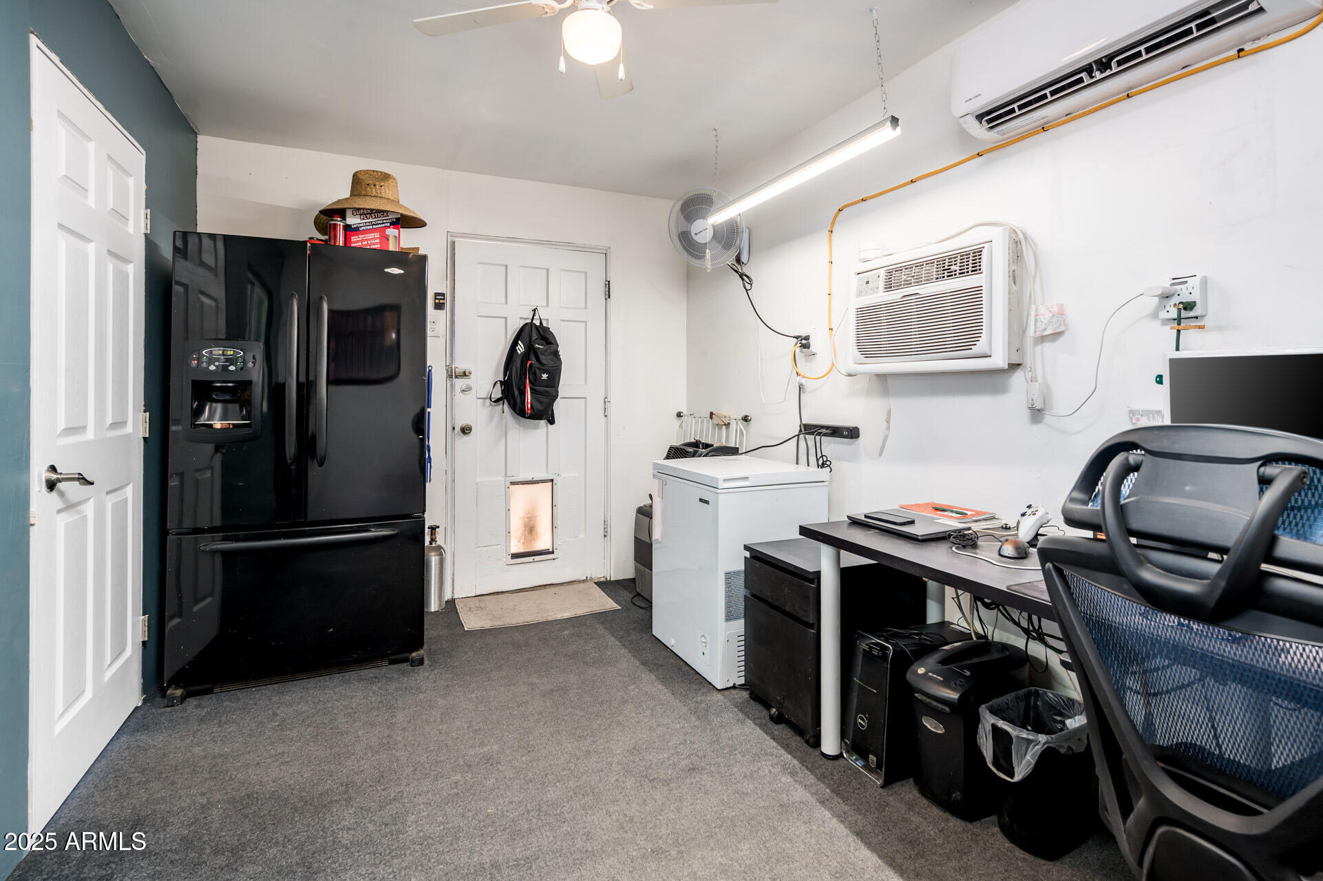2221 West Mitchell Drive Phoenix, AZ 85015 - Photo 37 of 45 a view of a kitchen with a refrigerator and a sink