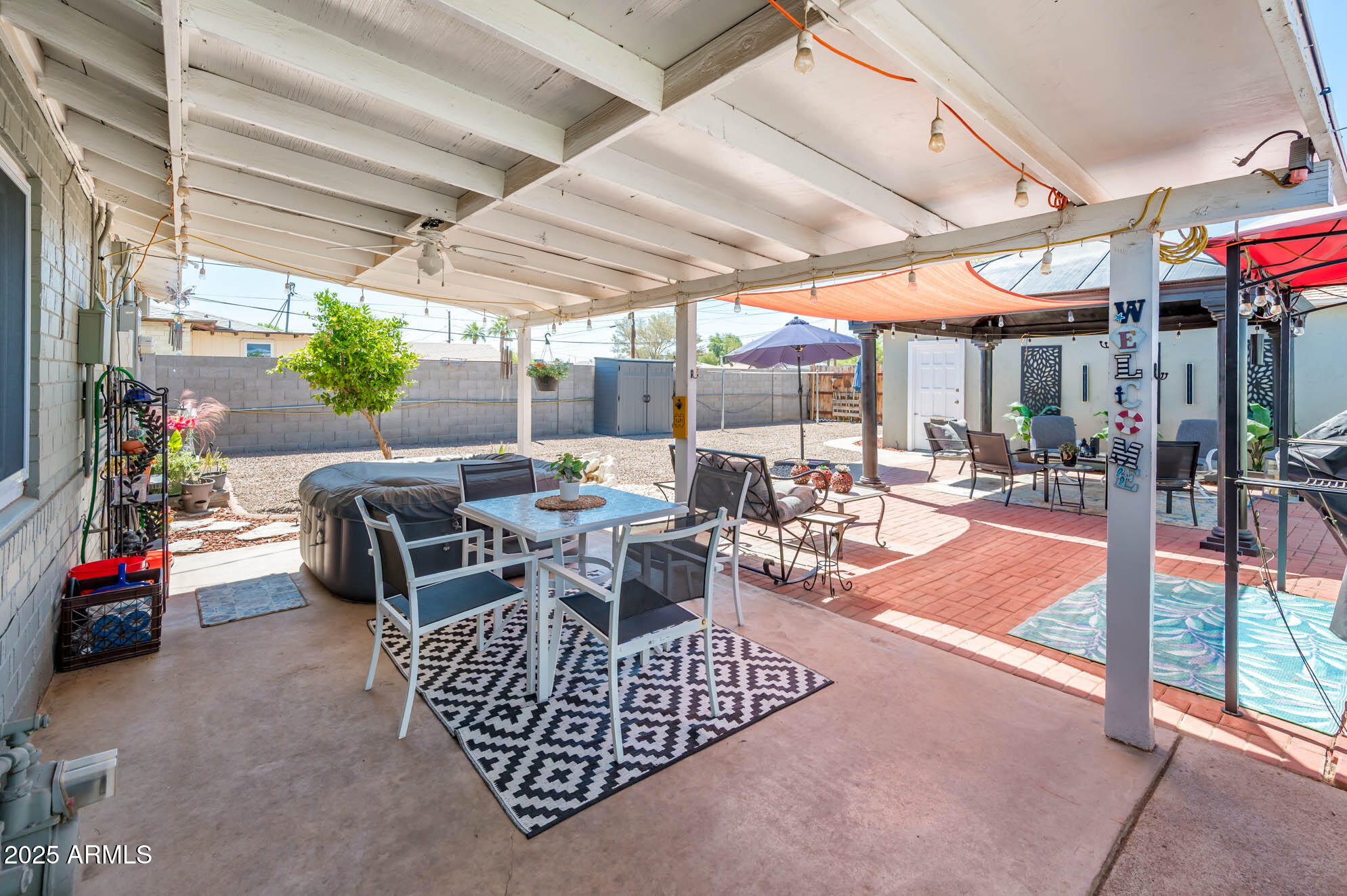 2221 West Mitchell Drive Phoenix, AZ 85015 - Photo 8 of 45 a outdoor space with lots of tables a chairs and a grill