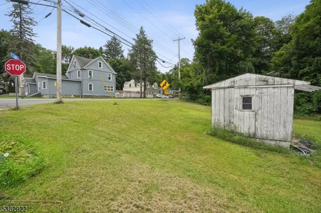 a view of a patio with swimming pool table and chairs