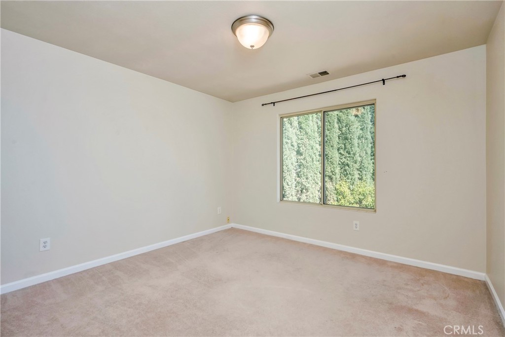 15632 Little Peak Road Hidden Valley Lake, CA 95467 - Photo 23 of 42 an empty room with a window