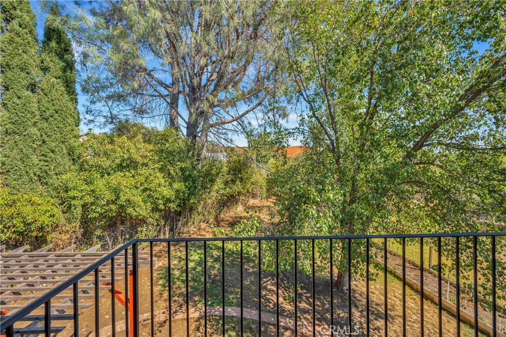 15632 Little Peak Road Hidden Valley Lake, CA 95467 - Photo 28 of 42 a view of a balcony with a pot