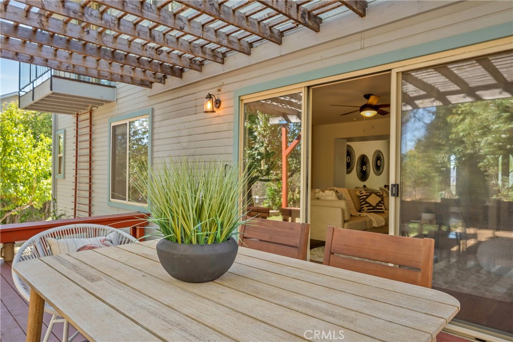 15632 Little Peak Road Hidden Valley Lake, CA 95467 - Photo 32 of 42 a vase of flowers sitting on a table