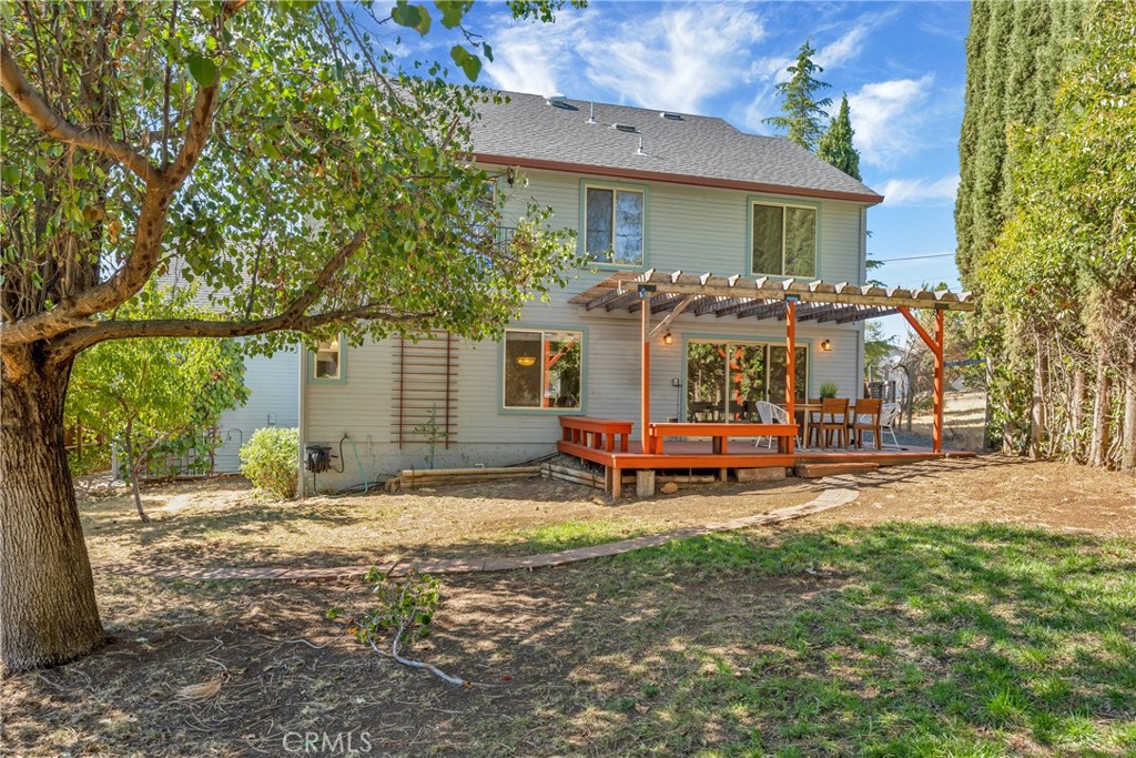 15632 Little Peak Road Hidden Valley Lake, CA 95467 - Photo 35 of 42 a view of a house with backyard porch and sitting area