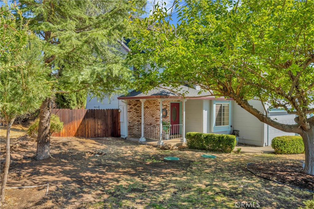 15632 Little Peak Road Hidden Valley Lake, CA 95467 - Photo 41 of 42 a view of a house with a yard