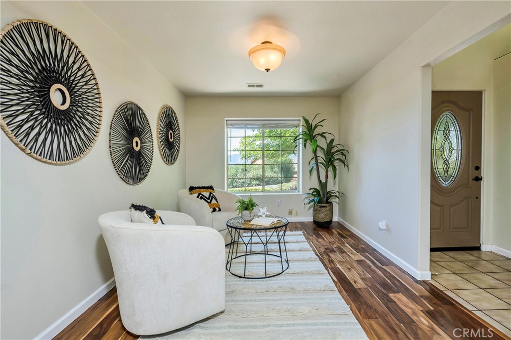 15632 Little Peak Road Hidden Valley Lake, CA 95467 - Photo 5 of 42 a living room with furniture and a large window