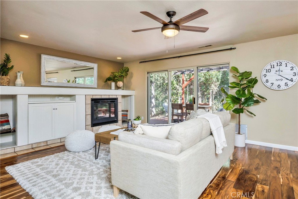15632 Little Peak Road Hidden Valley Lake, CA 95467 - Photo 7 of 42 a living room with furniture and a fireplace