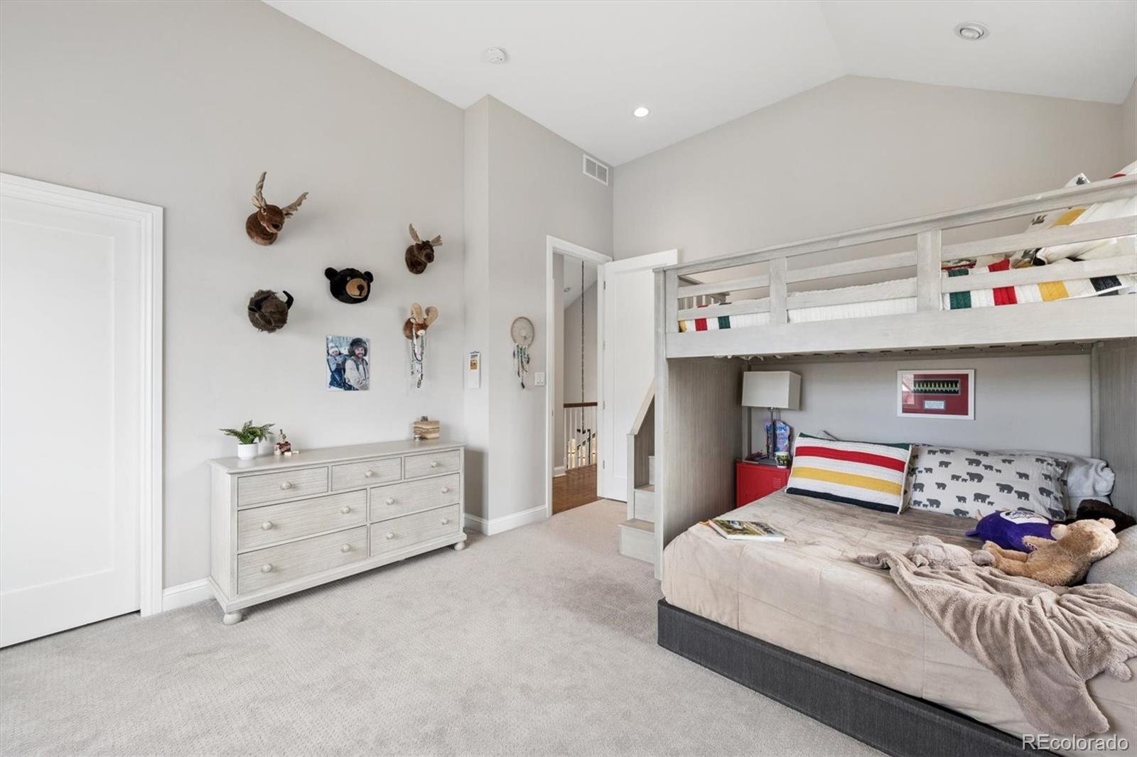 2700 Stuart Street Denver, CO 80212 - Photo 22 of 49 a bedroom with a bed and a dresser