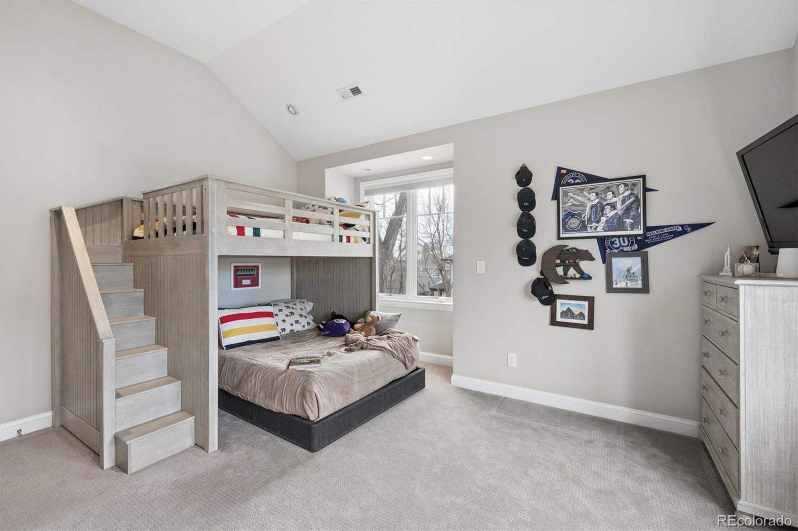 2700 Stuart Street Denver, CO 80212 - Photo 23 of 49 a bedroom with furniture and white walls