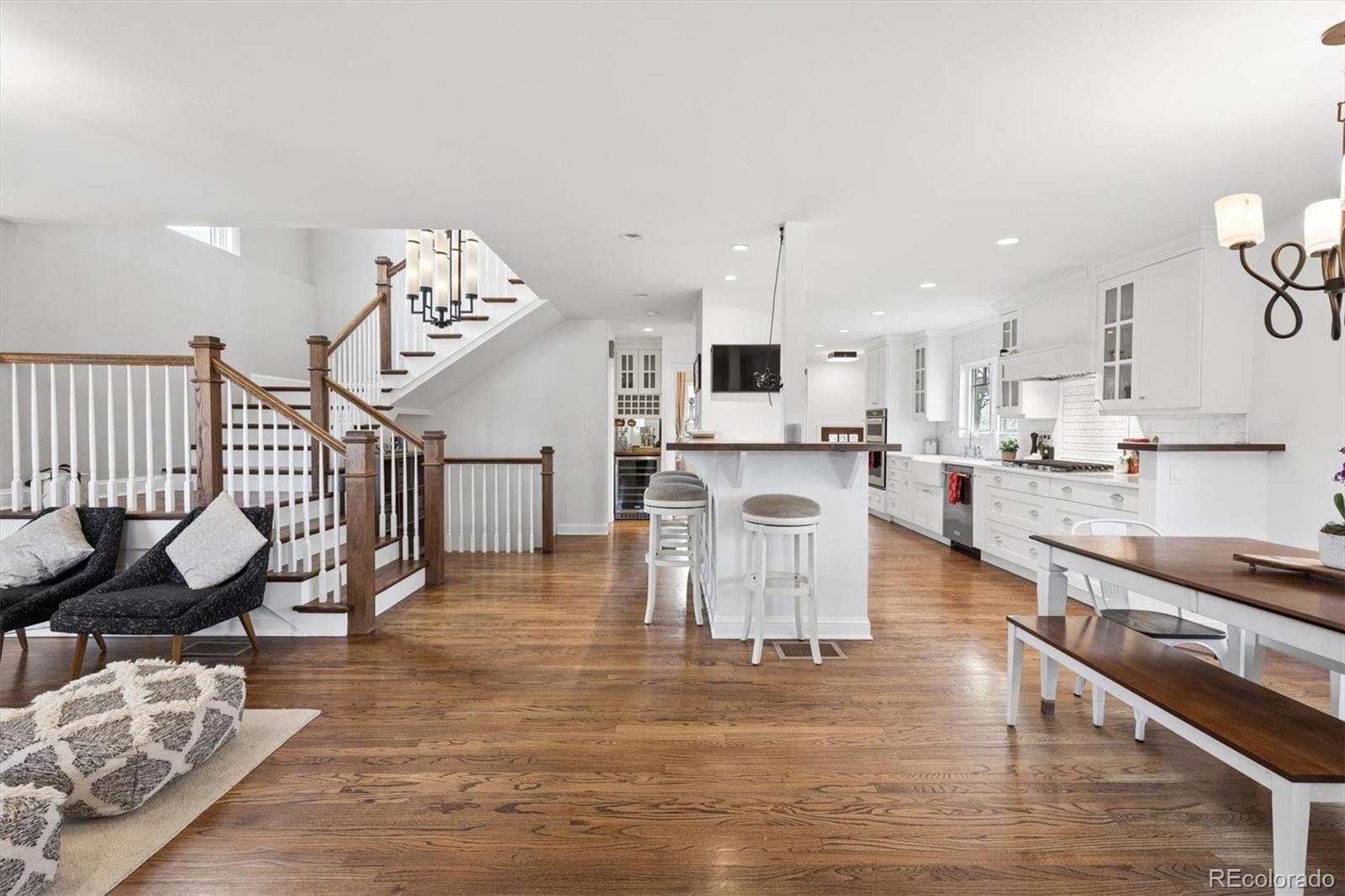 2700 Stuart Street Denver, CO 80212 - Photo 3 of 49 a living room with furniture and kitchen view