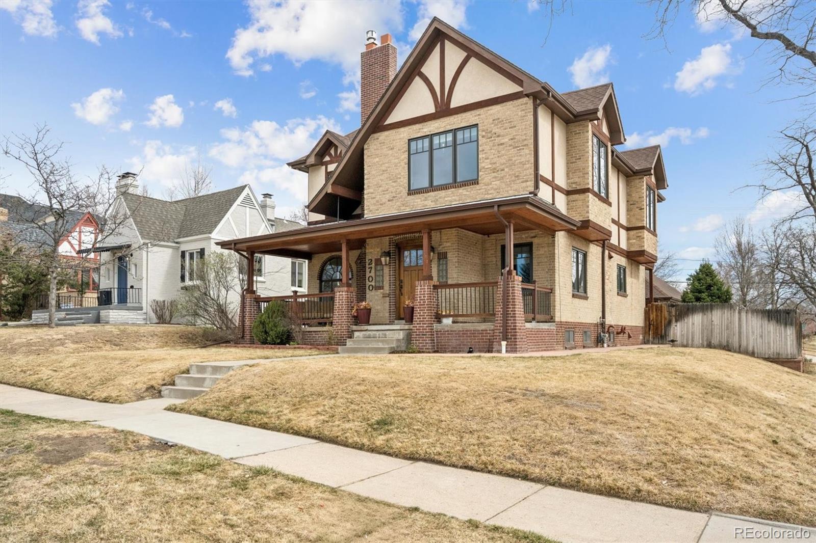 2700 Stuart Street Denver, CO 80212 - Photo 37 of 49 a front view of a house with a yard