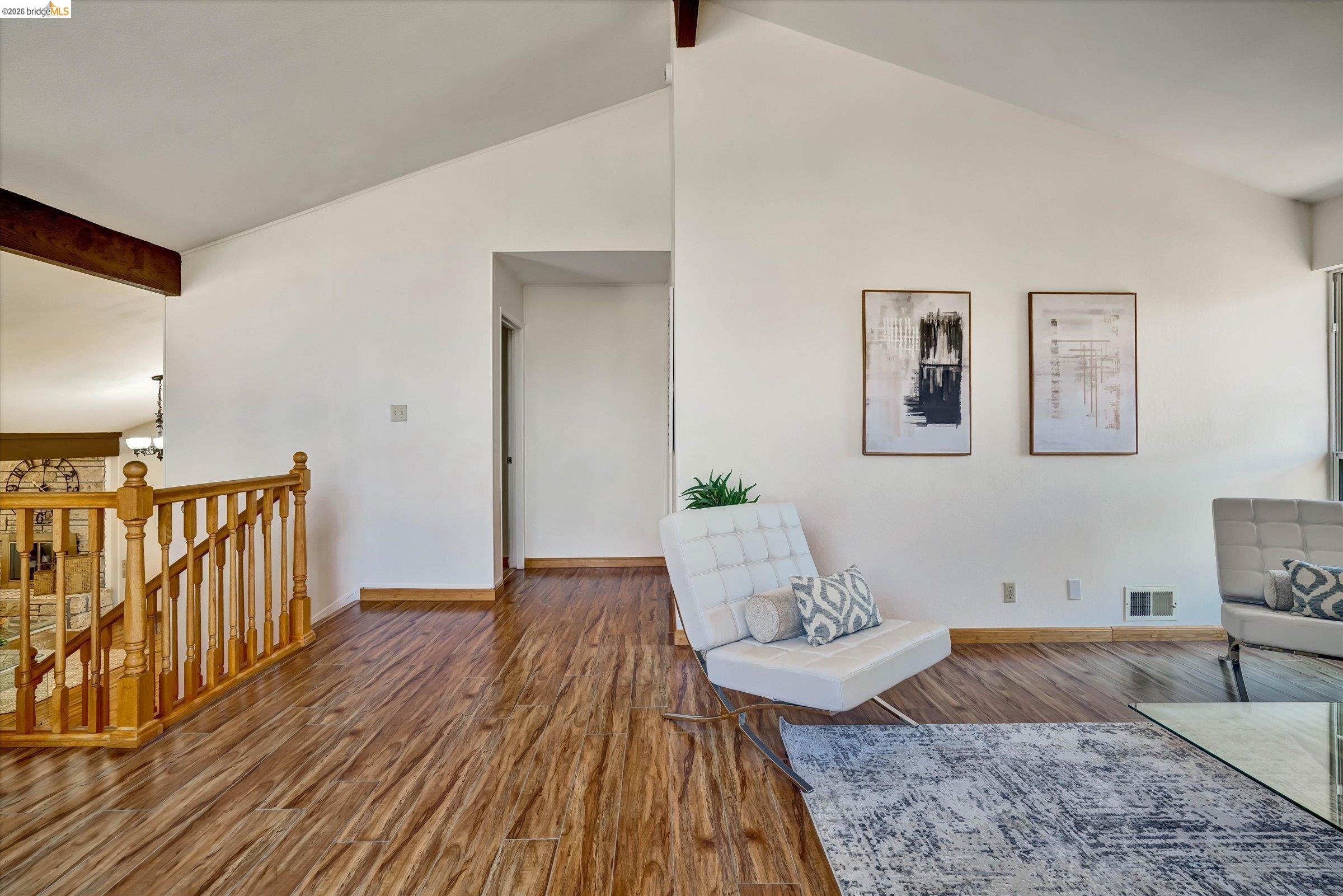2826 Wright Avenue Pinole, CA 94564 - Photo 36 of 70 High vaulted ceilings complement the wood-finish flooring throughout this inviting interior