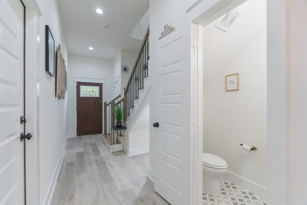 890 Lucky Street, Unit A Houston, TX 77088 - Photo 21 of 48 a bathroom with a toilet and a shower