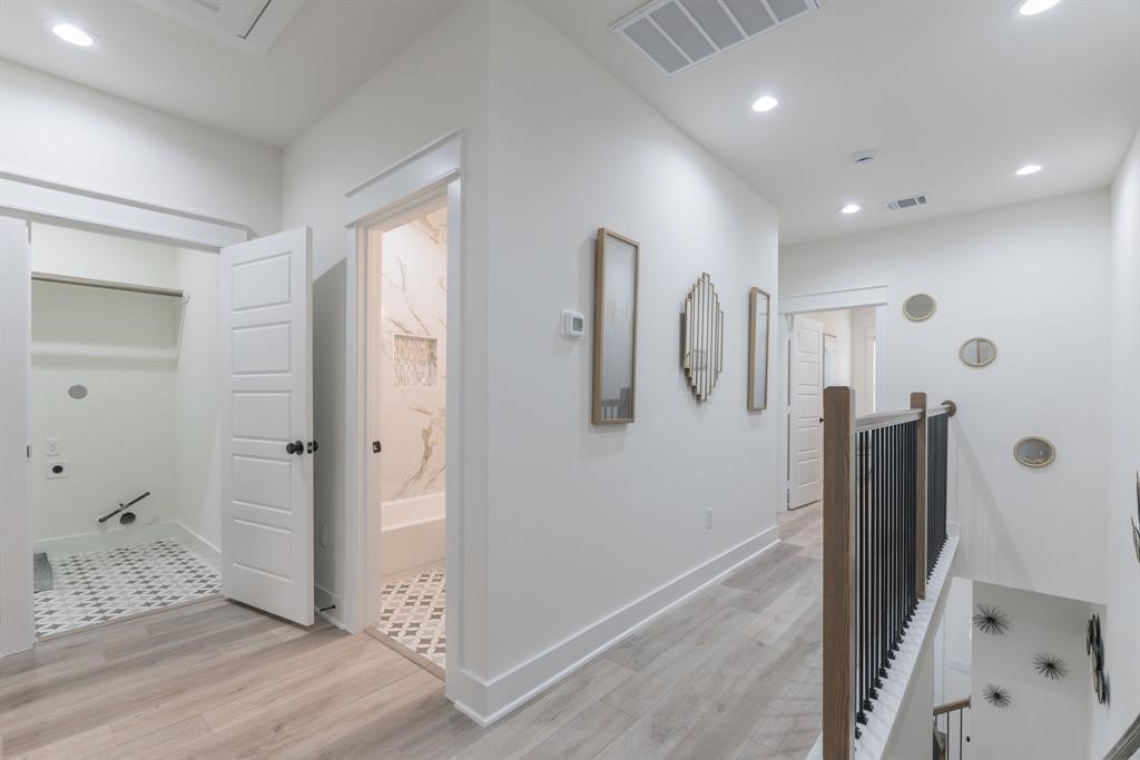 890 Lucky Street, Unit A Houston, TX 77088 - Photo 26 of 48 a bathroom with a shower and a sink