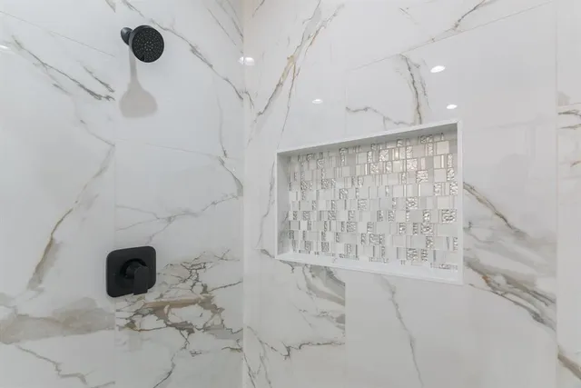 a work room with furniture and windows