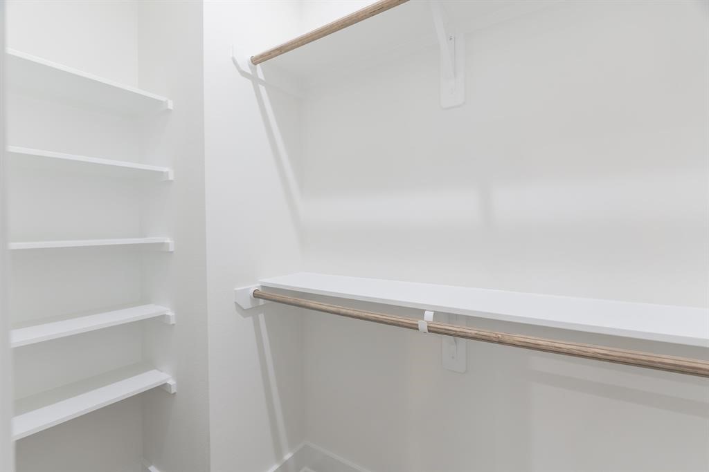 890 Lucky Street, Unit A Houston, TX 77088 - Photo 33 of 48 a close up view of racks on the wall