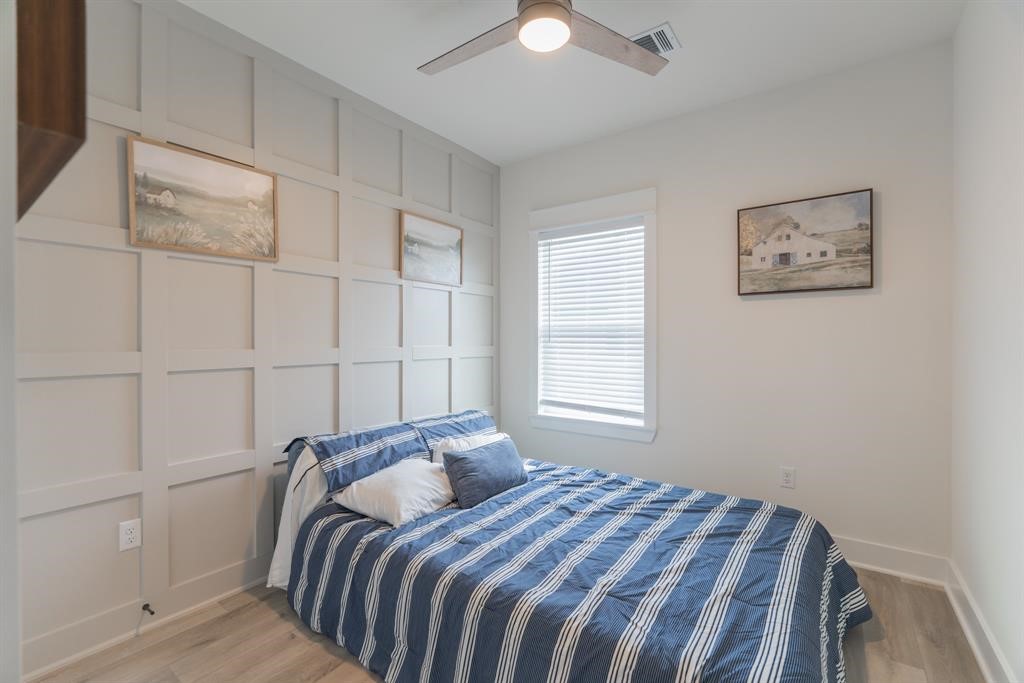 890 Lucky Street, Unit A Houston, TX 77088 - Photo 36 of 48 a bedroom with a bed and a window