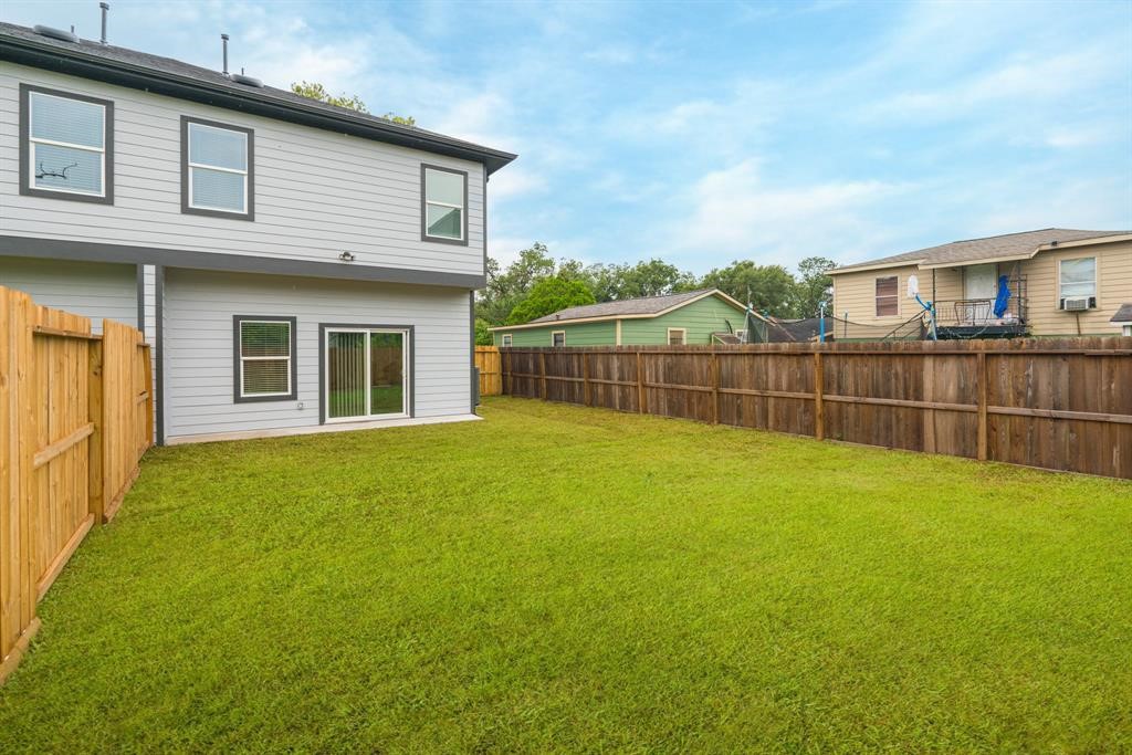890 Lucky Street, Unit A Houston, TX 77088 - Photo 46 of 48 a view of a backyard