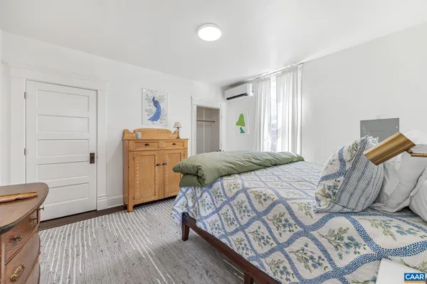 a view of entryway with wooden floor