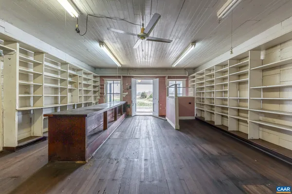 a view of workspace with furniture and window