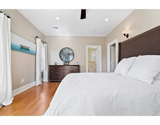41 Pilgrim Road Marblehead, MA 01945 - Photo 14 of 30 a bed room with a bed mirror and a window