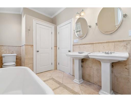 41 Pilgrim Road Marblehead, MA 01945 - Photo 16 of 30 a spacious bathroom with a sink and a mirror