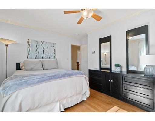 41 Pilgrim Road Marblehead, MA 01945 - Photo 20 of 30 a bedroom with a bed and a dresser
