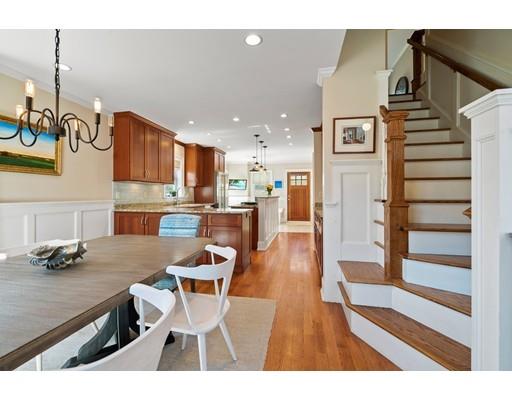 41 Pilgrim Road Marblehead, MA 01945 - Photo 2 of 30 a dining room with furniture and a kitchen view