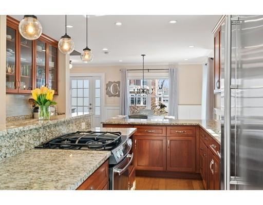41 Pilgrim Road Marblehead, MA 01945 - Photo 3 of 30 a kitchen with stainless steel appliances granite countertop a sink a stove and a refrigerator