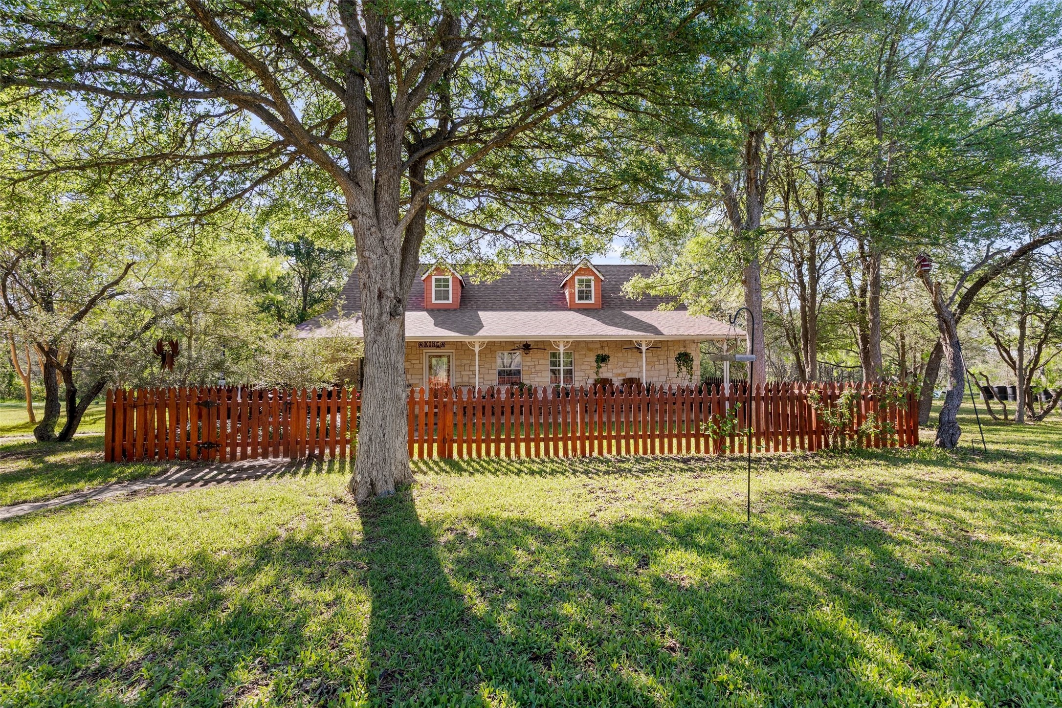 399 Upper Elgin River Road Elgin, TX 78621 - Photo 2 of 39 View of front of home with a porch and a shingled roof