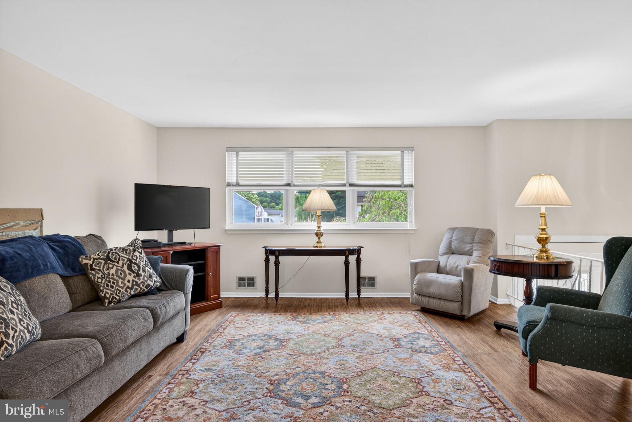 46 Trinity Avenue Marlton, NJ 08053 - Photo 6 of 37 a living room with furniture and a flat screen tv